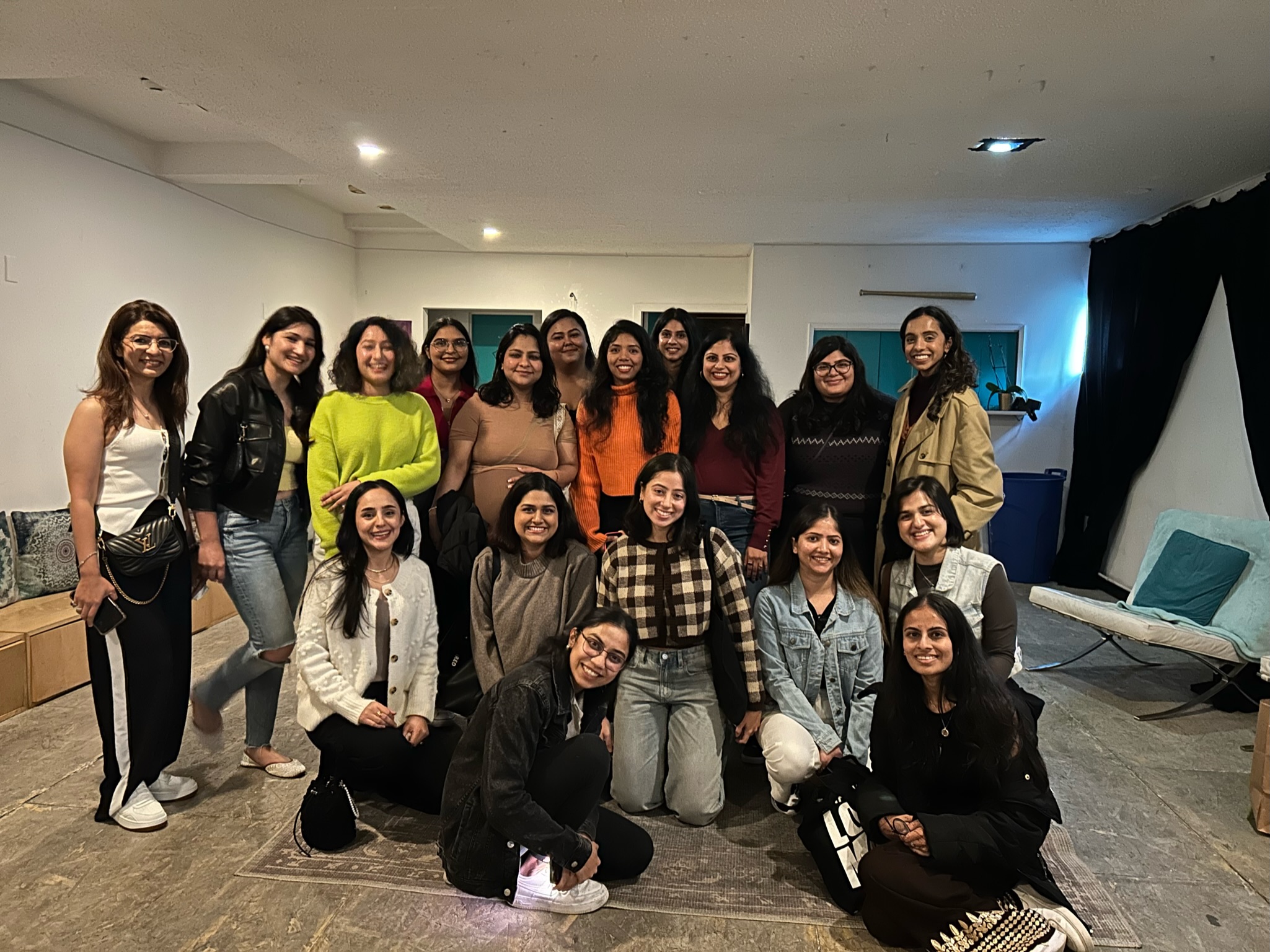 women celebrating together at a mitti event